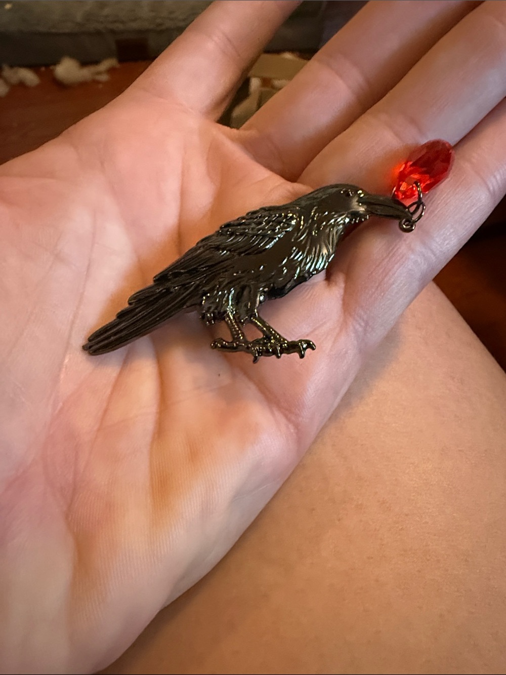 Glossy Black Raven Pendant with Red Crystal pin